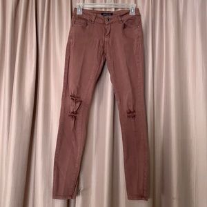 Mid-rise distressed jeans